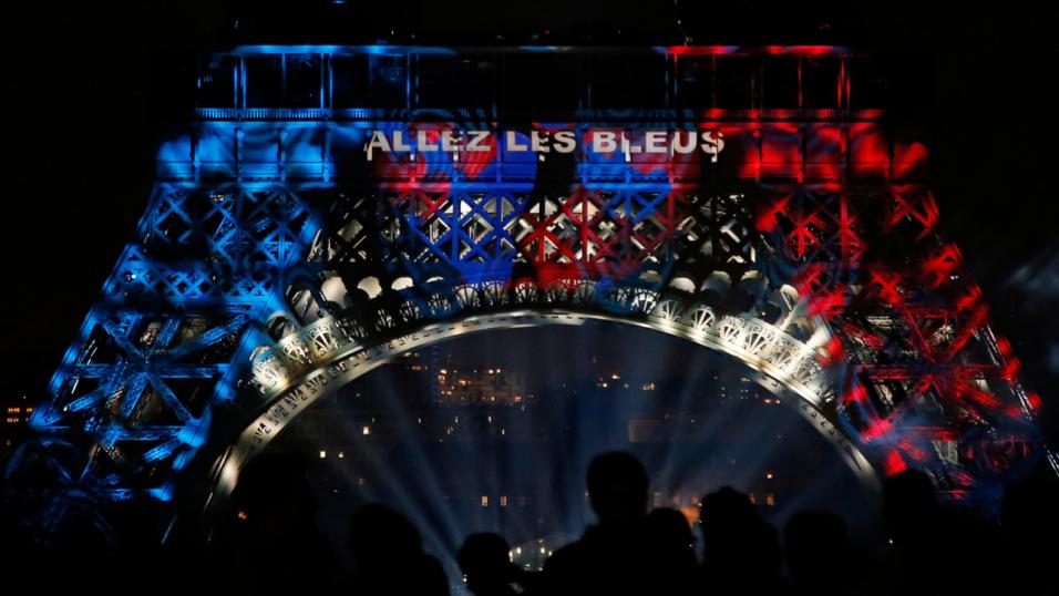 The Eiffel Tower lit up to inspire the French football team.